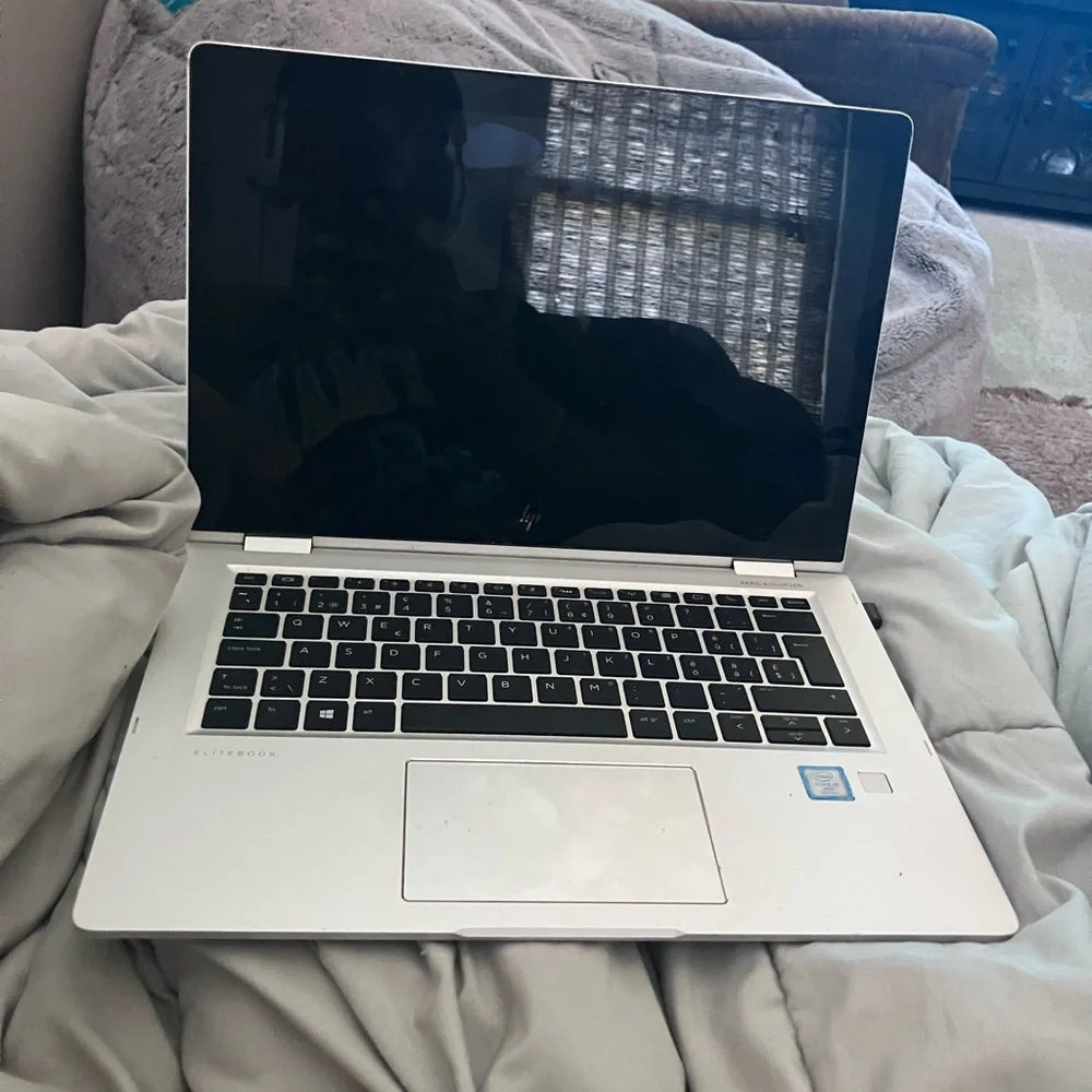 Intel Core i7 vPro Sticker on Silver Surface with Blue Accent